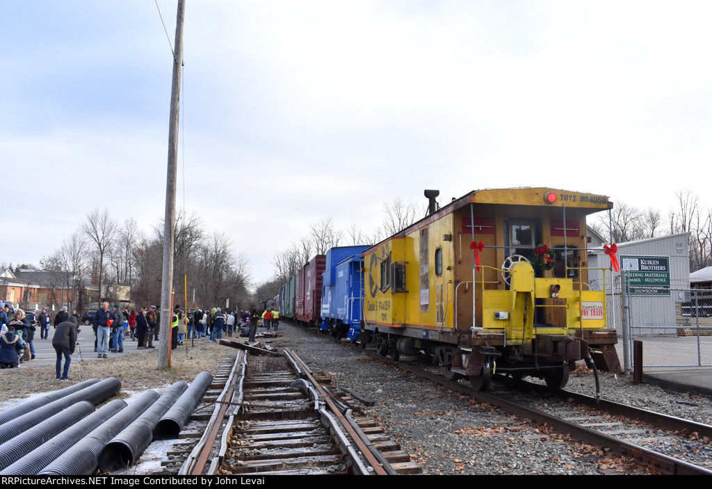 This is a rear view of the train stopped in Downtown Warwick just as the toys are being collected by the TFT train crew